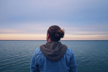 Person looking out to sea