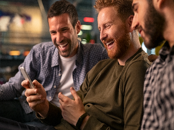 Group of people sitting together in circle