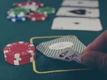 Person looking at cards in casino