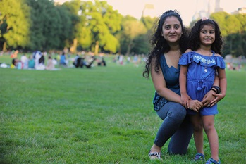 Mother and daughter in a park