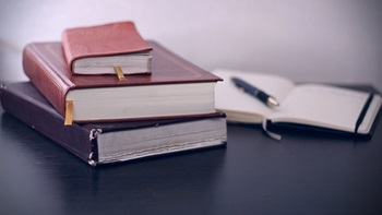 Pile of books on a table