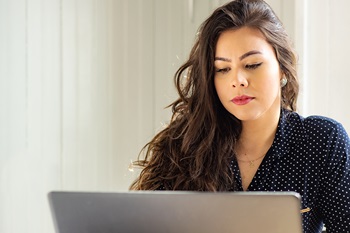 Woman using laptop