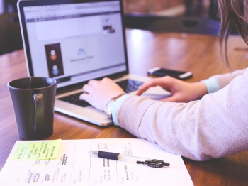 Woman at work on laptop